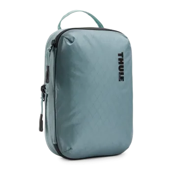 Compression packing cube