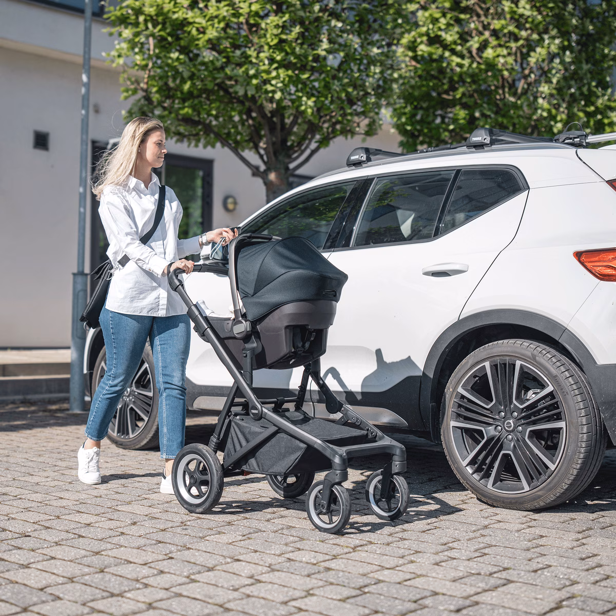 Thule Sleek
linnakäru melange hall mustal