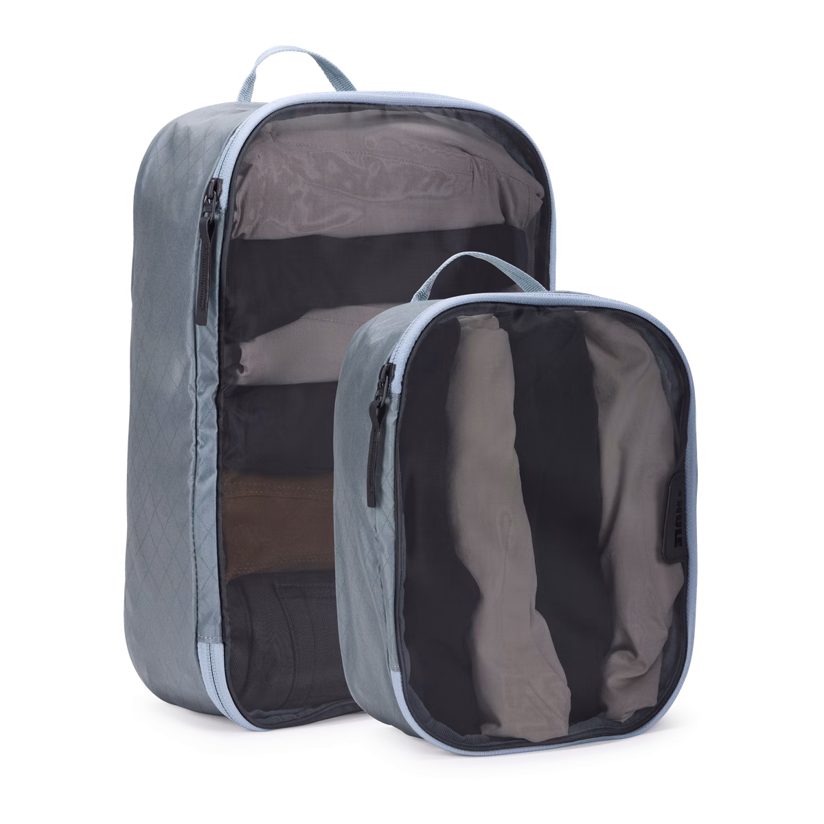 Thule packing cube set
komplekt, mis sisaldab 1 keskmist pakkimiskuubikut ja 1 väikest pakkimiskuubikut tiigihall