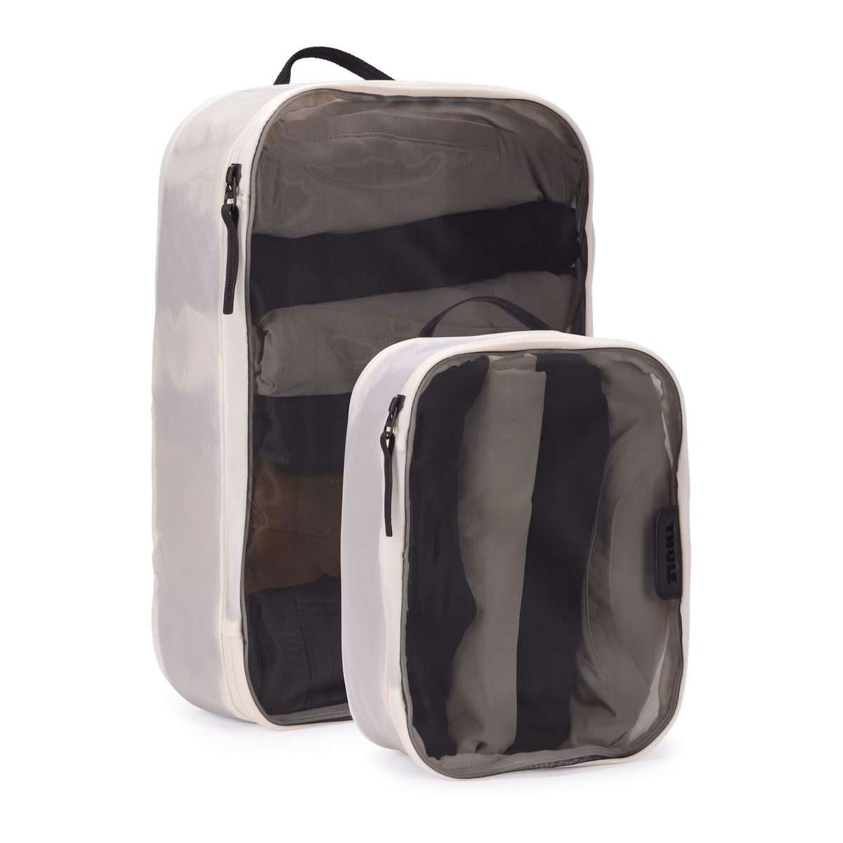 Thule packing cube set
komplekt, mis sisaldab 1 keskmist pakkimiskuubikut ja 1 väikest pakkimiskuubikut valge